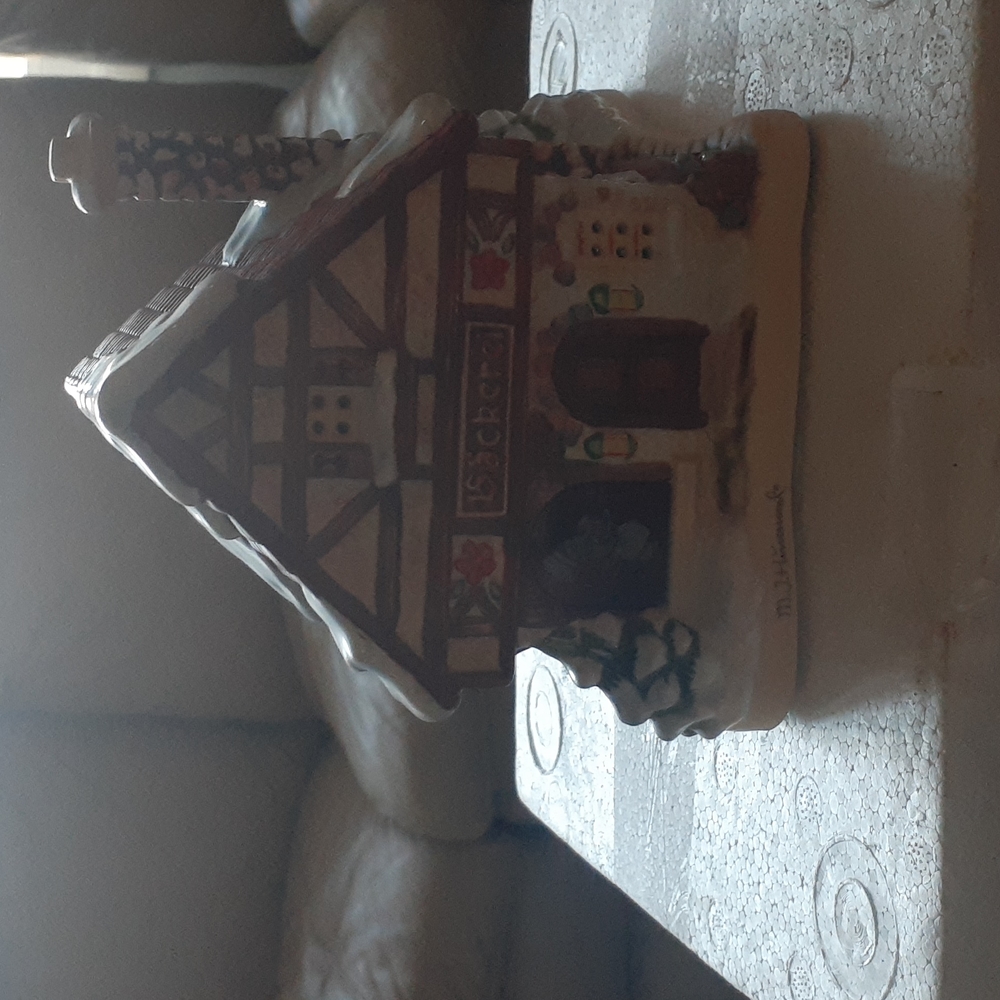M.J. Hummel porcelain "Village Bakery" sculpture.